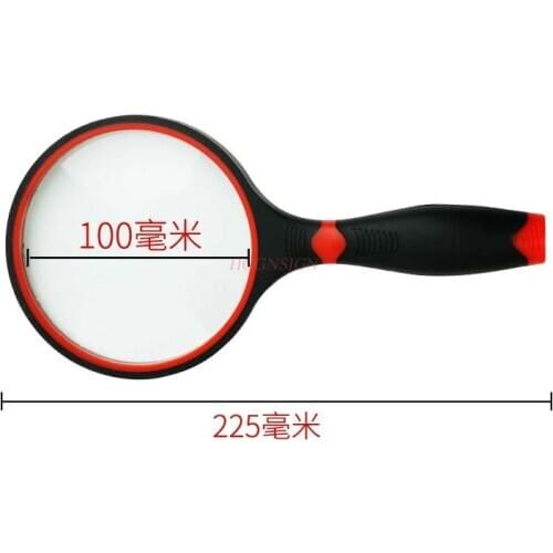 Magnifying equipment Holding a magnifying glass 10 times for the elderly to read and observe the plant student
