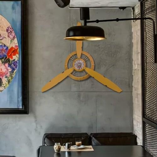 Retro nostalgic industrial wind aircraft wall clock American creative iron living room pendant simple atmospheric decoration