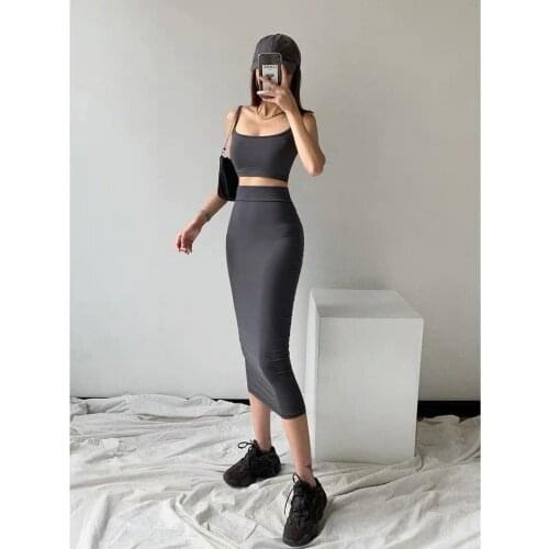 European and American new 2021 summer high waist medium length tight hip slim elastic skirt womens suspender vest two piece set