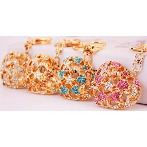 XDPQQ factory wholesale supply creative crystal hollow peach heart keychain metal pendant jewelry small gift girl