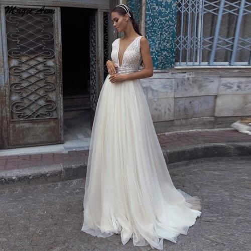 Magic Awn Charming Lace Tulle Wedding Dresses Beach Light Champagne Boho Backless Bride Dress Sheer Scoop A-Line Robes Mariee