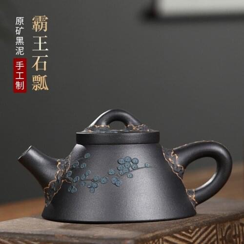 Wholesale manufacturers selling ore black mud pine needle stone gourd ladle kung fu tea teapot agent undertakes