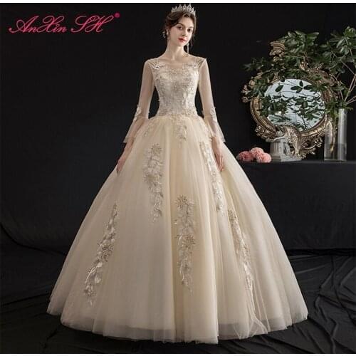 AnXin SH princess flower champagne lace wedding dress vintage beading crystal o neck long flare sleeve white wedding dress