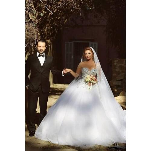 Designer Luxury Crystals Long Sleeves Ball Gowns Wedding Dresses Rhinestones Lace-up Back Arabic Wedding Gown Sheer Neck Vestido