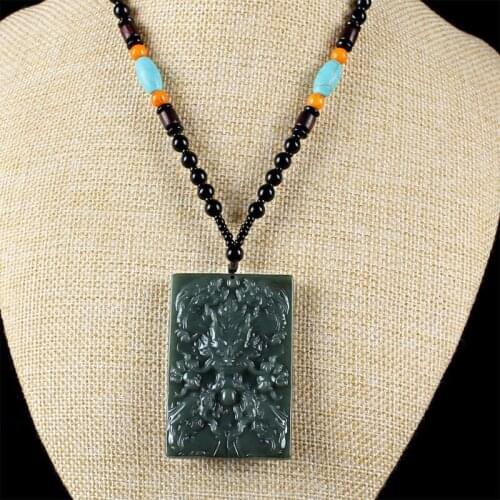 Xinjiang hetian jade qingyu jiuzhu jade brand zodiac dragon head pendant
