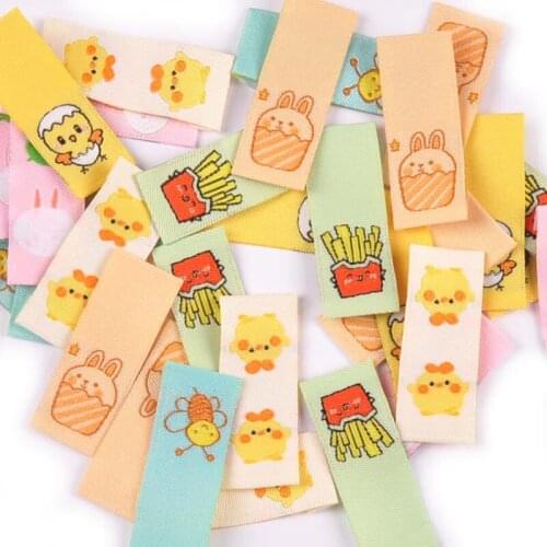 50Pcs Lovely Cartoon Embroidery Labels For Sewing Garment Care Bags Tags Handmade Clothes Accessories DIY Crafts 15x40mm C2780