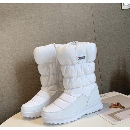 Women boots short tube flat snow boots female 2020 new winter warm plush fur non-slip white thick bottom high top Martin boots