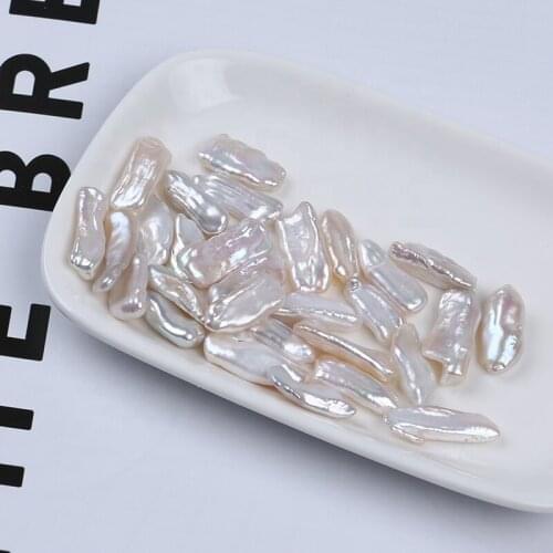 Wholesale white 17-24*7-10mm big size irregular shape biwa freshwater loose pearls beads low price
