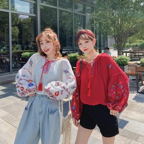 MUMUZI Flower embroidery shirt 2019 autumn new female long-sleeved lantern sleeves loose tassel blouse cotton doll shirt