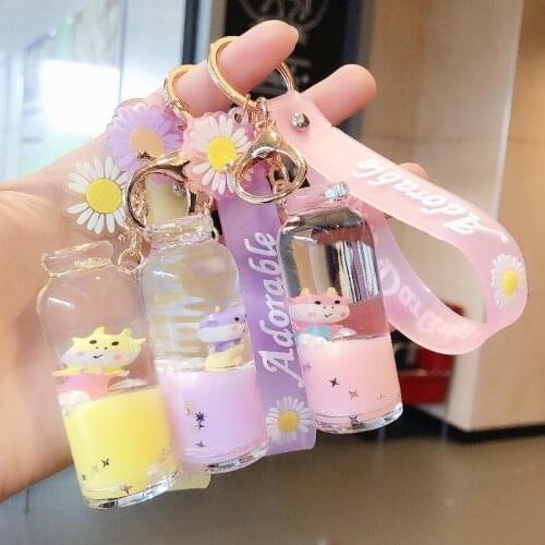Cute Maverick Doll Keyring Cylindrical Milk Liquid Floating Keychain Creative Drifting Bag Car Pendant Key Holder Ornament
