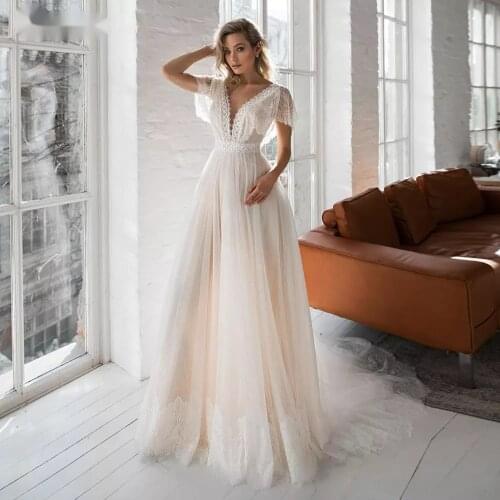 2021 New Designs Boho Wedding Dress Cap Sleeve Lace Appliques Dot Tulle Bride Gowns V-Neck Backless Beach Wedding Party Gowns