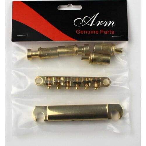 Golden electric guitar fixed bridge The guitar is drawing board