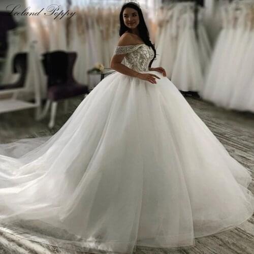 Lceland Poppy Womens Off the Shoulder Ball Gown Wedding Dresses 2021 Luxury Tulle Floor Length Crystal Beaded Bridal Dress