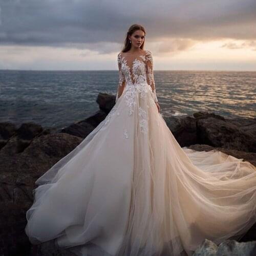 Flowing Scoop Neckline Crystal Beading Tulle Lace Beach Wedding Dress Long Sleeve Sweep Train Wedding Gowns