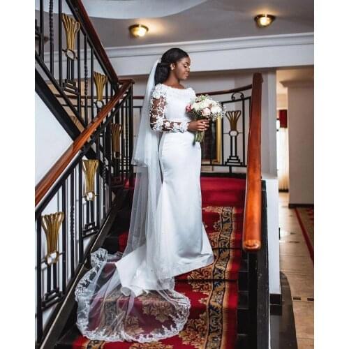 African ILlsion Long Sleeve Mermaid Wedding Dresses Detachable Train Plus Size Lace Pearls Wedding Gowns Vestido de Novia