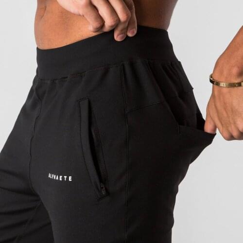 QNPQYX New men muscle fitness running training sports cotton trousers mens breathable Slim beam mouth casual health pants Male