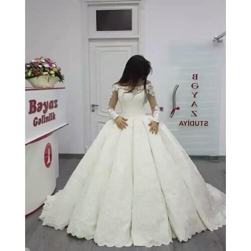 Elegant Sheer Lace Long Sleeve Ball Gown Wedding Dresses 2021 Off The Shoulder Beading Applique Boat Neckline Bridal Gowns