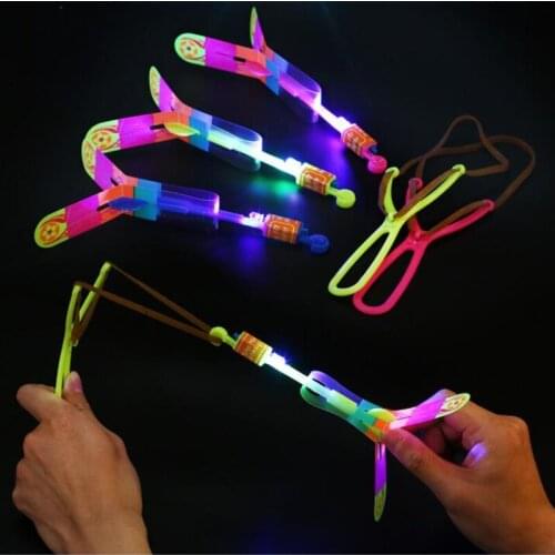 Outdoor Shining Rocket Flash LED Light Slingshot Elastic Helicopter Rotating Outdoor Flying Toy Arrow Party Gift Childrens Favor