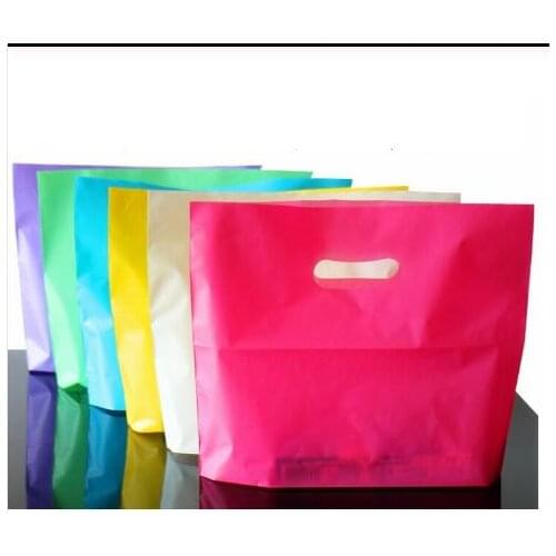 50pcs Colorful Plastic Shopping Bags with Handle Pink Boutique Clothes Gift Packaging Bag Plastic Shopping Bags Handles 4 sizes
