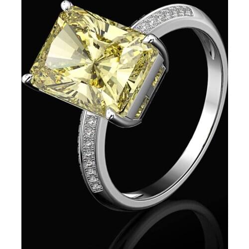 Womens S925 pure silver imported high carbon yellow diamond ring car flower round pointed bottom goose yellow fashion jewelry