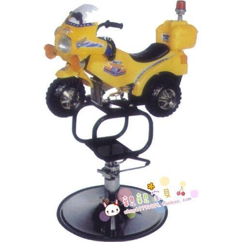 Childrens bikes for haircut. The barber chair. Cartoon car a haircut