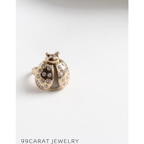 Nine nine carat European and American style gold flash drill cat eye lovely firefly insect exaggeration ring female (PG)