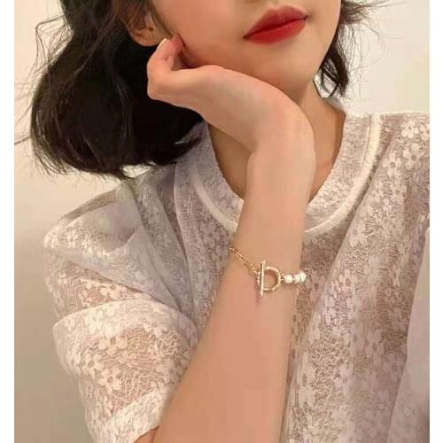 New Korean version of the character fu gold-plated pearl bracelet women tide cold wind light luxury hand ornaments fashion