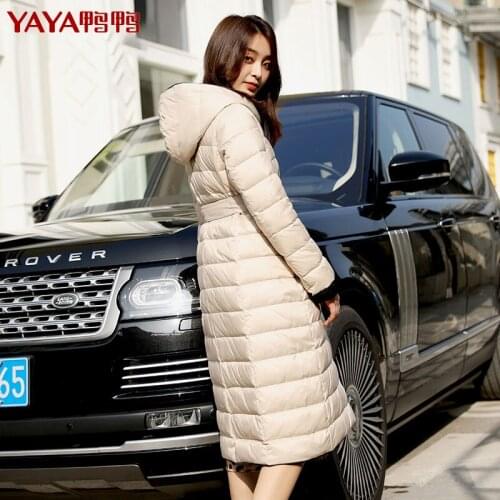 YAYA 2021 Women Puffer Jackets Windproof Warm Fashion Hood Winter White Goose Down Women long Over Coat Ladies Parkas Padded