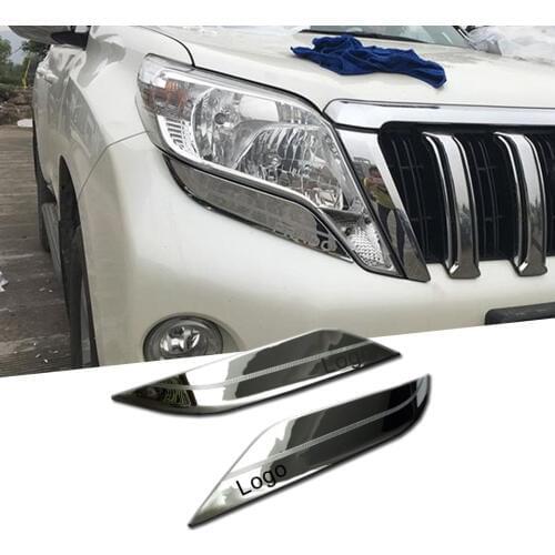 2 Pcs ABS Chrome Headlight Eyebrow Lamp Cover Trim With Logo For Toyota Land Cruiser 150 Prado LC150 FJ150 2010 - 2019