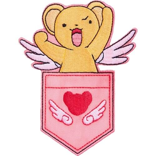Card Captor Sakura Patches Kero chan pops out of a pocket to greet you for Clow Card hunting