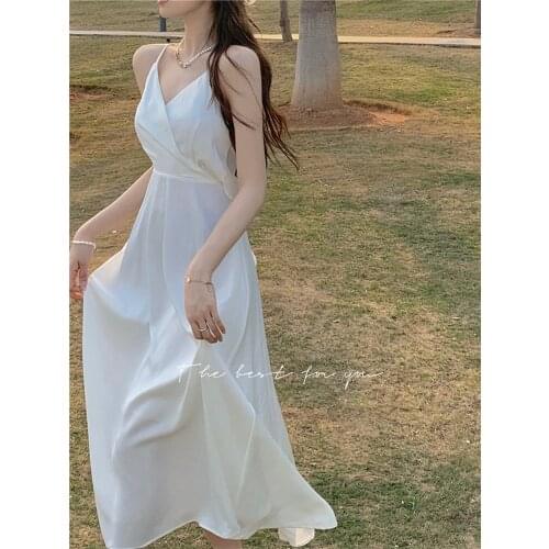 Strap dress female sexy backless bow white dress 2021 summer new French retro dress