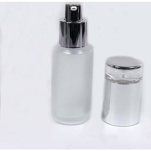 40ml Lotion Bottles with Pump Frosted Glass Cosmetics Container with Silver Lid