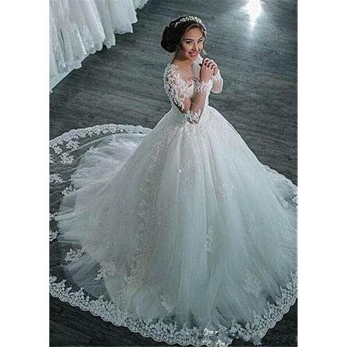 Fresh LookingTulle Sheer Long Sleeves Jewel Neckline Ball Gown Wedding Dresses Beaded Lace Appliques Bridal Gowns
