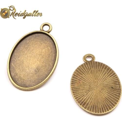Reidgaller 20pcs antique bronze oval cabochon settings 18x25mm dia blank pendant tray diy jewelry base findings