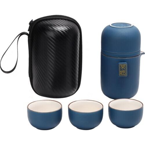 Kung Fu Travel Tea Set Ceramic Set A pot of two or four cups of outdoor tea on board separates the Express Cup