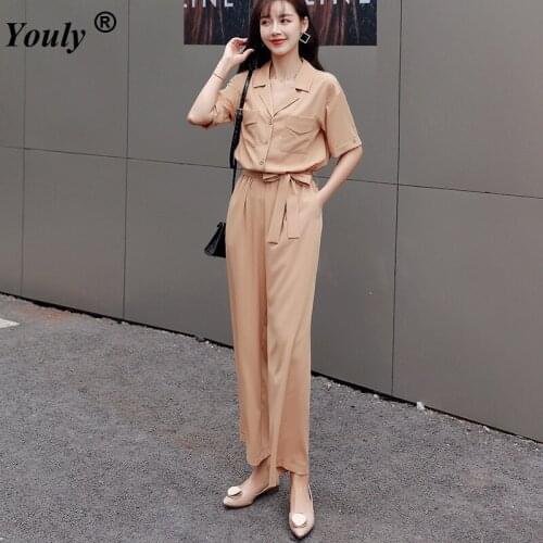 Solid Elegant Women Jumpsuit 2020 Summer Deep V Neck Button Shirt Turndown Collar Short Sleeve Office Lady One Piece Romper Belt
