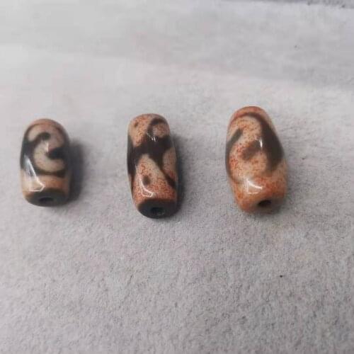 1pcs/lot of natural agate dzi beads with various totem Huya patterns Symbol of wealth Lucky Talisman nique. Huya King Kong Money