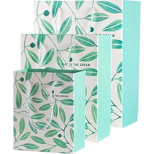 Custom Own Logo Printed Retail Clothing Packaging Paper Bag Shopping Packaging Paper Bag For Clothes