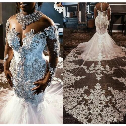 Plus Size African Mermaid Wedding Dresses Sheer Jewel Neck Illusion Long Sleeves Luxury Stones Lace Appliques Bridal Gown