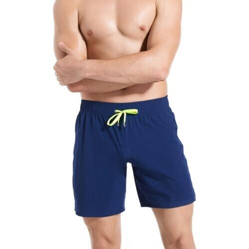 2020 Mens New Beach Pants Pure Color Thin Quick Drying Pants European And American Fashion Slim Sports Shorts Beach Swimming