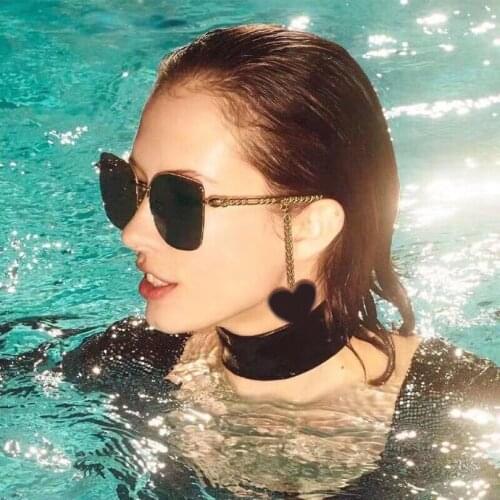 Square metal frame women sunglasses with heart shaped charms