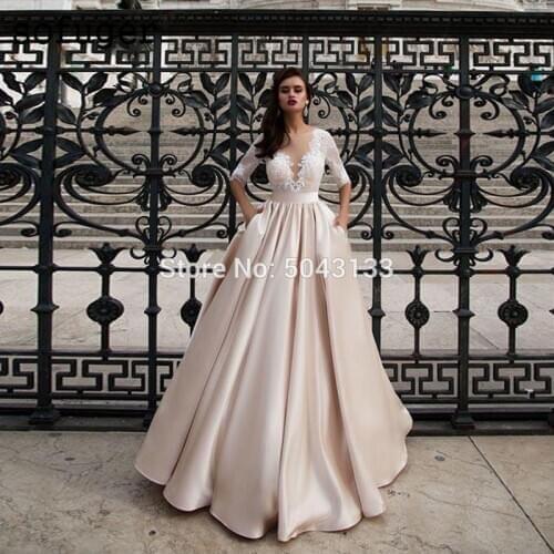 Modest Satin Wedding Dresses With Pocket Vestido de Noiva Lace Half Sleeve Bridal Gown 2021 Floor Length Champagne Bride Dresses