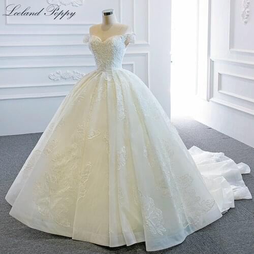 Lceland Poppy A-Line Boat Neck Wedding Dresses 2021 Short Sleeves Floor Length Chapel Train Lace Appliques Bridal Gowns