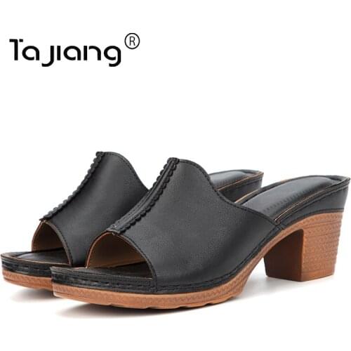 Ta Jiang New thick-soled wedge-heel slippers European and American fashion hollow thick-heeled high-heel slippers T0533-87