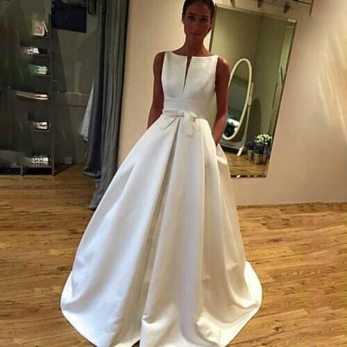 MYYBLE 2021 Modern Wedding Dresses O Neck Bow Sashes With Pockets Draped Wedding Gowns Backless Bridal Dresses vestido de noiva
