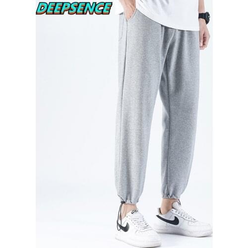 Men Casual Sports Sweatpants Four Seasons Loose Fashion Beam Leg Pants Skin Friendly Fabric Drawstring Ankle Length Pants Men
