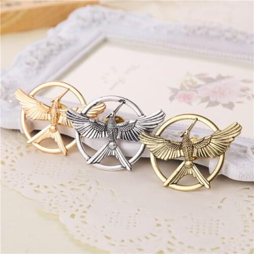 Hunger Games Brooch Pin Bird Eagle Phoenix Arrow Logo Badge Vintage Fashion Hot Animal Game Movie Jewelry Women Kids Wholesale