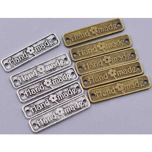 100Pcs/lot 2.50x0.60cm Metal Alloy Handmade Letter Printed Labels Double Hole Clothing Labels For Garment Diy Sewing Materials