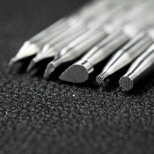 DIY handmade leather products vegetable tanned leather stainless steel leather leather carving printing tools background carved