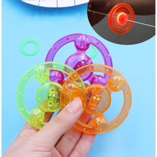 New 2021 Flash Pull Line Led Flywheel Hot Fire Wheel Glow Flywheel Whistle Creative Classic Toys for Children Gift Kids Toys